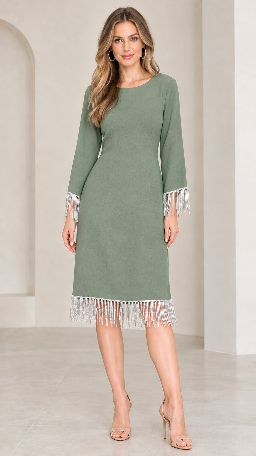 Front view of sage green knee-length cocktail dress with crystal tassel trim