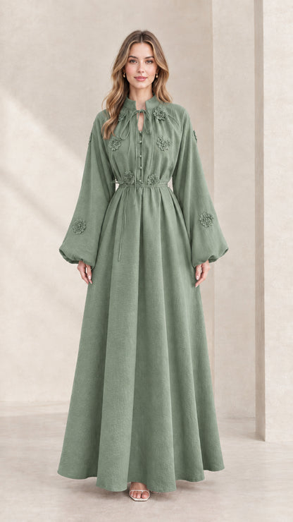 Front view of sage green embroidered tie-neck lantern sleeve maxi dress