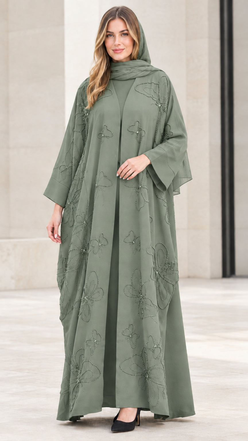 Front view of sage green beaded butterfly abaya ensemble with matching hijab