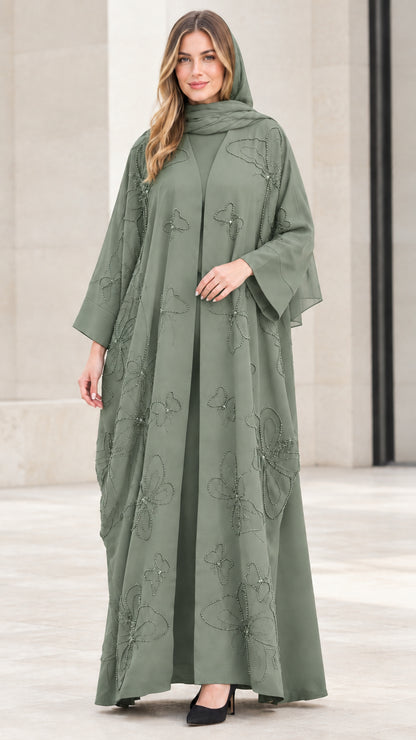 Front view of sage green beaded butterfly abaya ensemble with matching hijab