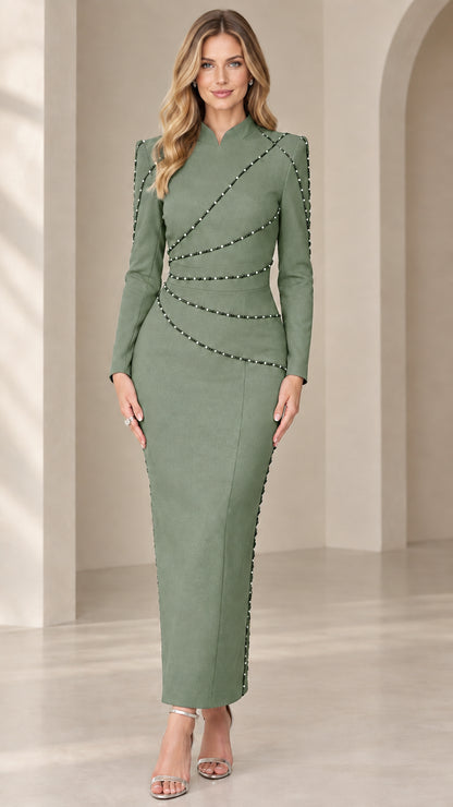 Front view of model wearing sage green long sleeve beaded column maxi dress