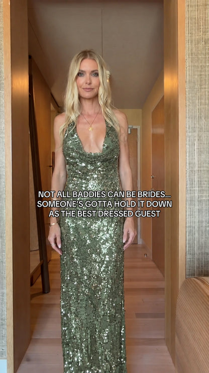 Front view of sage green sequin halter backless maxi gown