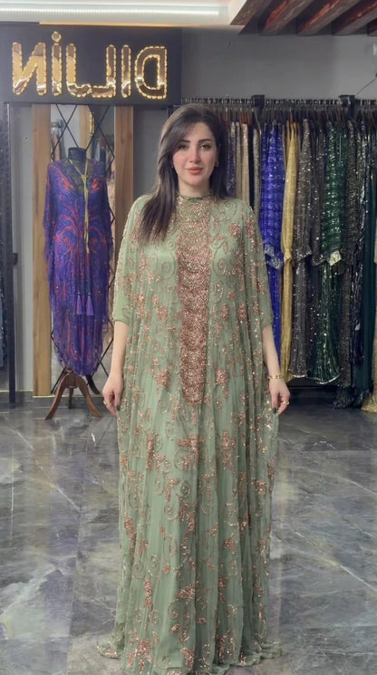 Front view of sage green hand-beaded evening kaftan gown