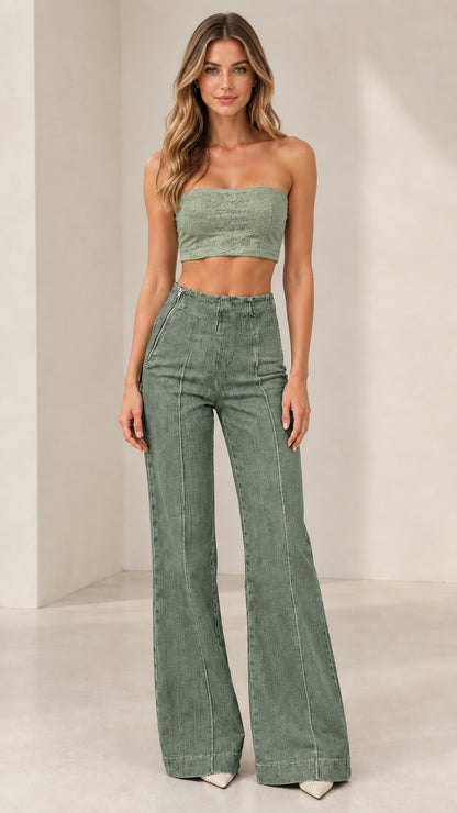Model wearing Sage Green high-rise flare jeans paired with green top