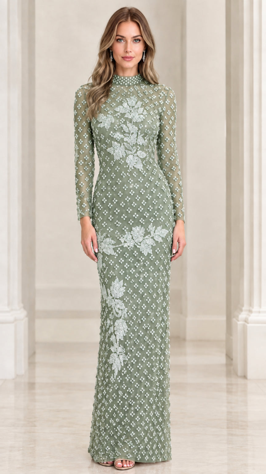 Front view of sage green beaded long sleeve evening gown with silver floral accents
