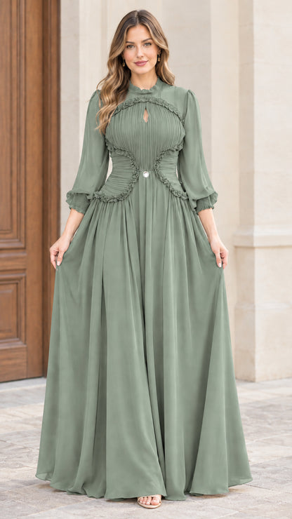 Front full-length view of woman wearing sage green long sleeve chiffon maxi dress