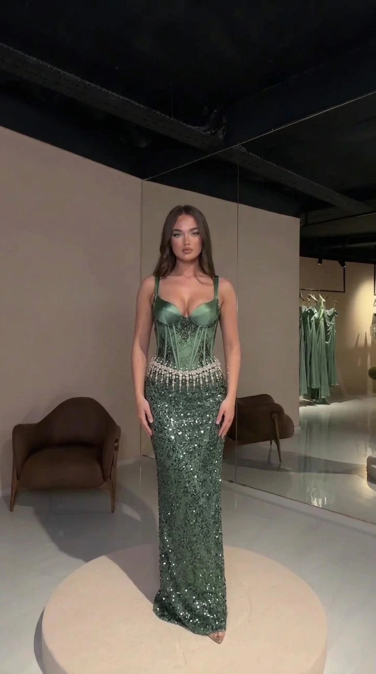 Emerald green sheer corset sequin evening gown