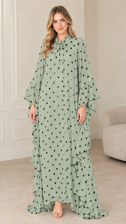 Full front view of sage green polka dot tie neck maxi kaftan dress