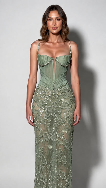 Sage green embellished corset evening gown on model