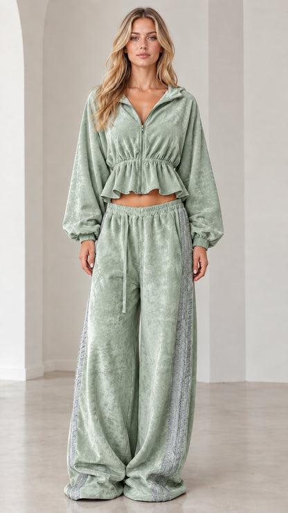 Full-length view of model wearing sage green velour cropped tracksuit set with wide-leg pants