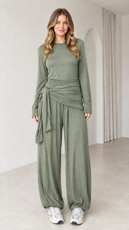 Front view of woman wearing sage green 2-piece long sleeve draped tie lounge set