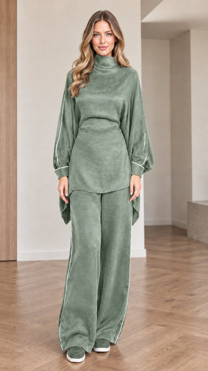 Front view of women wearing sage green mock neck tunic top and wide leg pants set