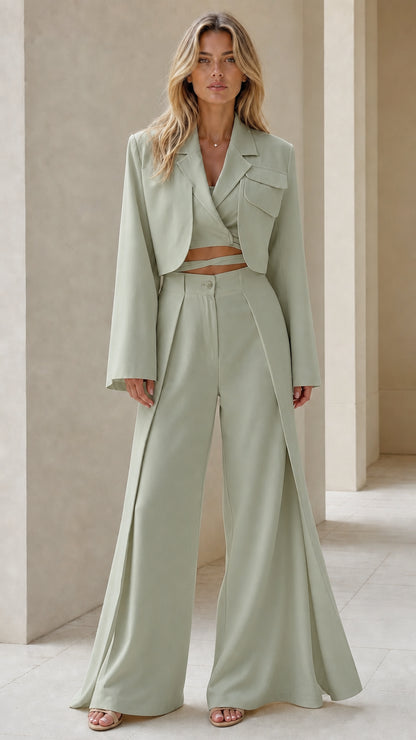 Front view of sage green tailored cropped jacket and pleated wide-leg pant set