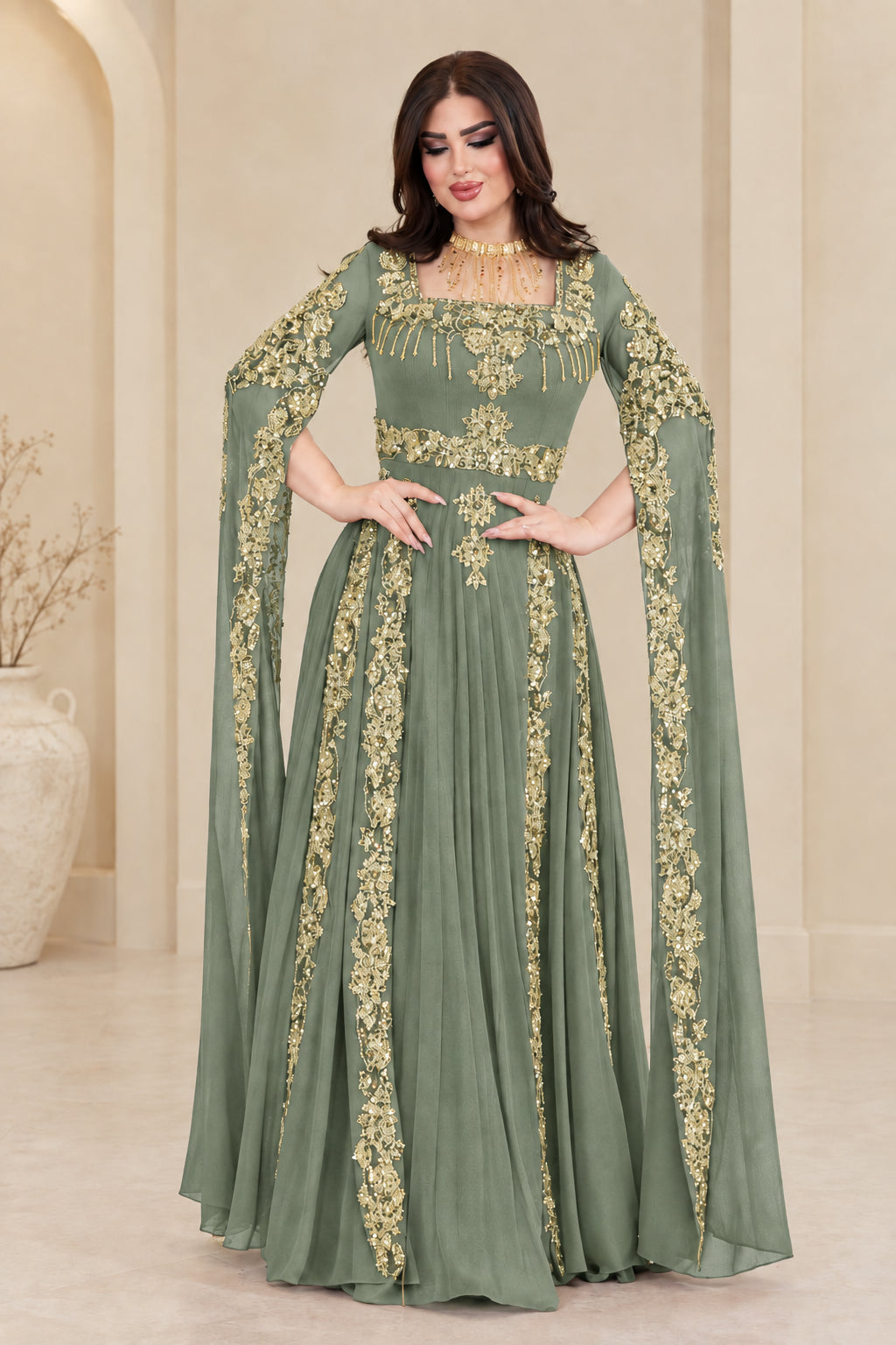 Sage green embroidered chiffon evening gown with split cape sleeves