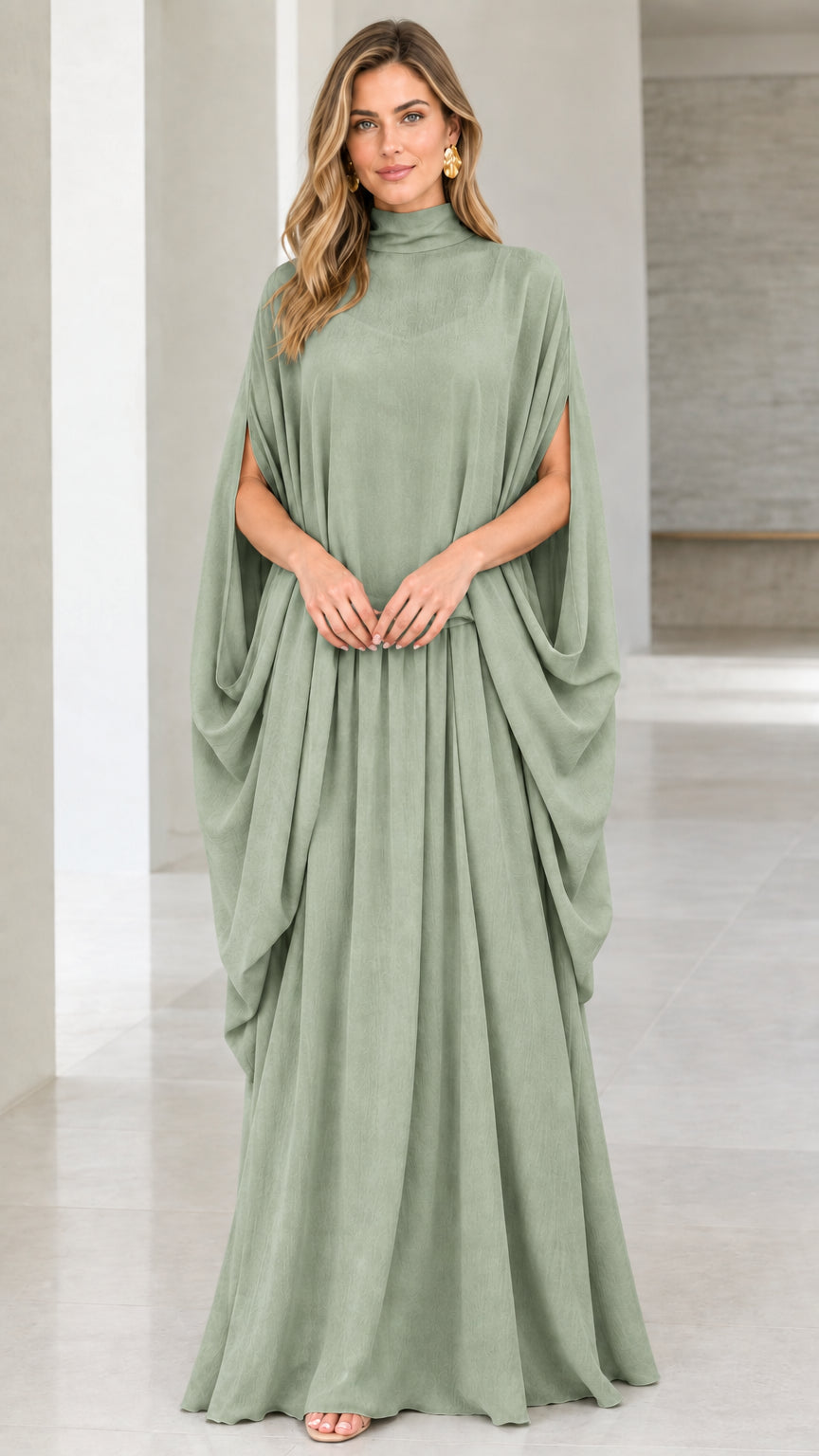 Front view of model wearing sage green high neck cape sleeve maxi dress