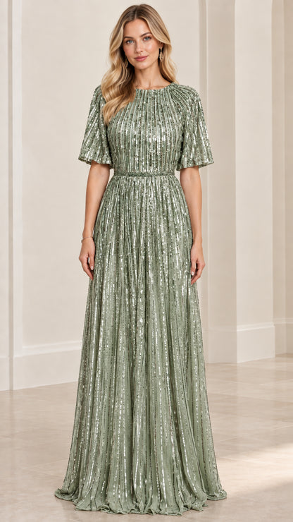 Front view of woman wearing sage green sequin pleated maxi gown