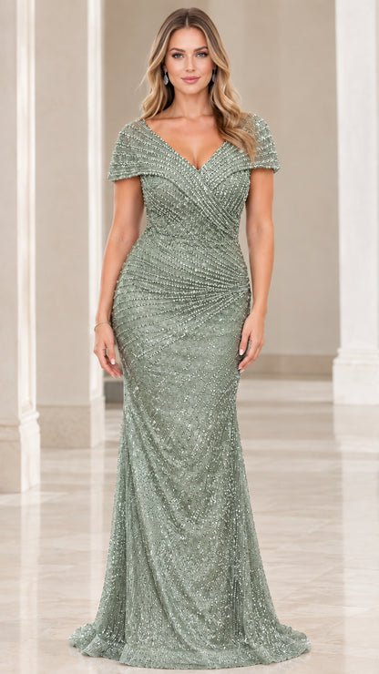 Front view of model wearing the sage green embellished formal gown