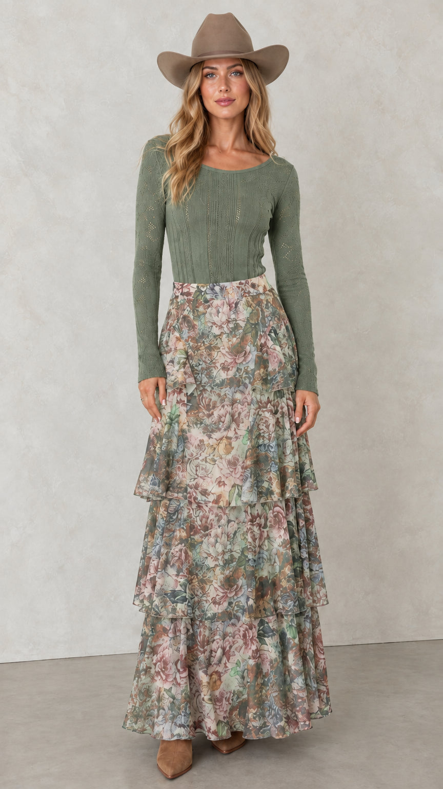 Model wearing Sage Green tiered floral maxi skirt with olive green top