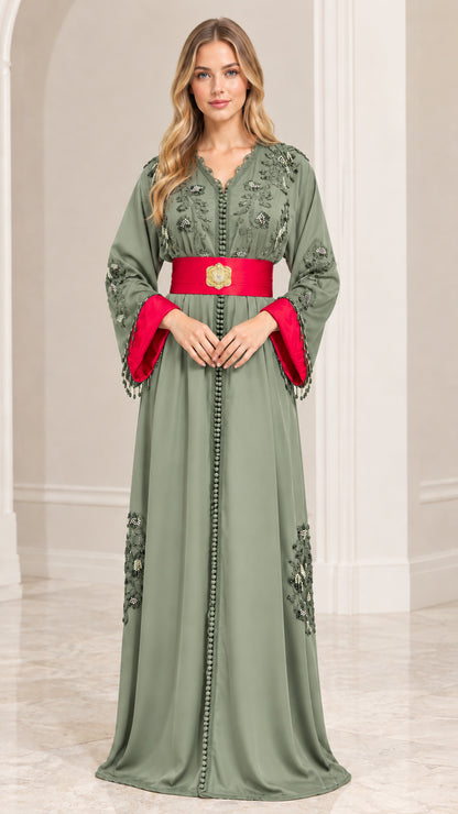 Front view of sage green embroidered Moroccan kaftan dress with red belt