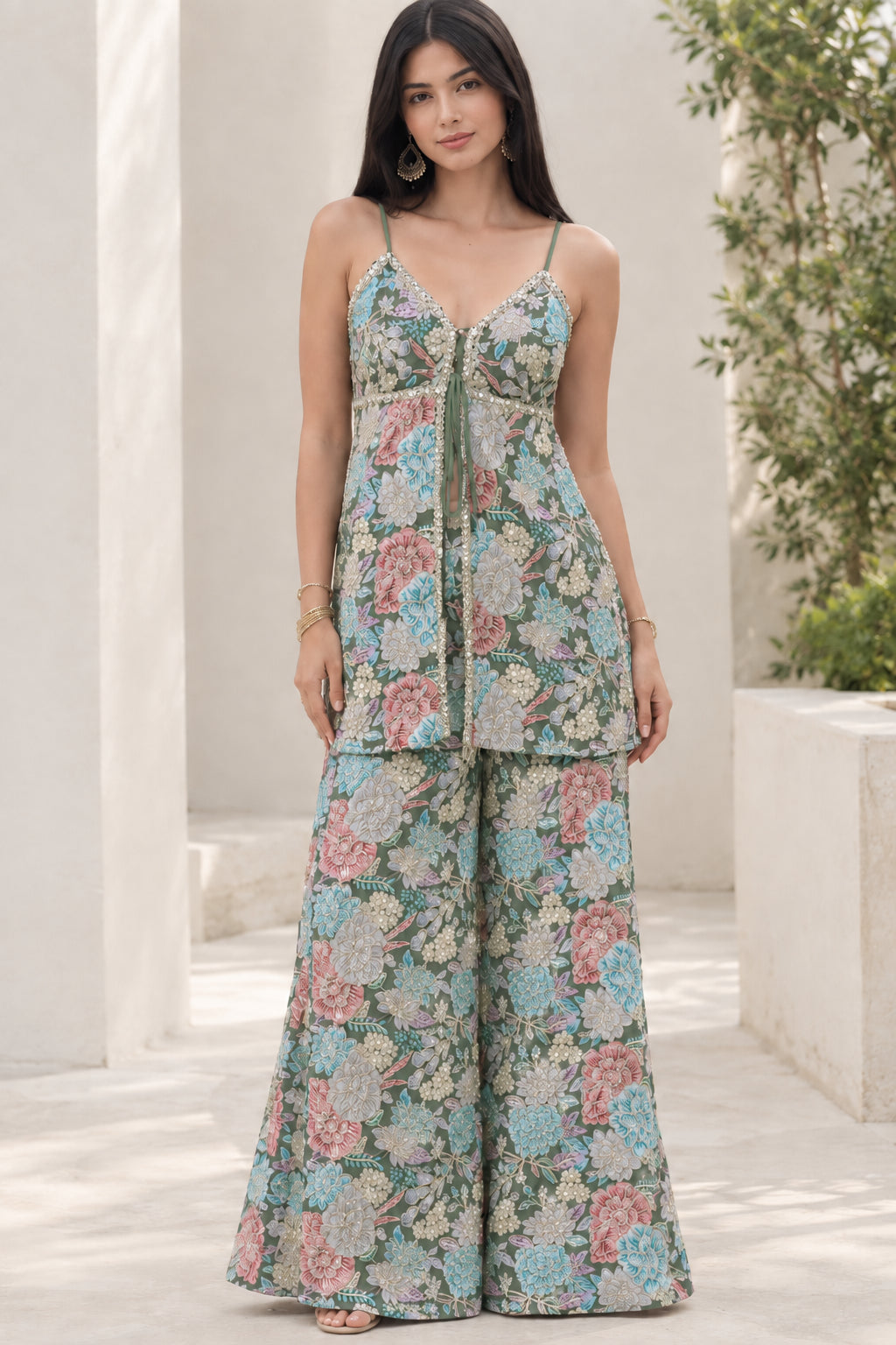 Model wearing Sage Green botanical floral print tunic top and matching flowy pants set