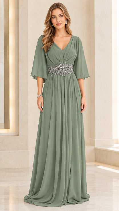 Woman wearing sage green flutter sleeve A-line chiffon formal gown