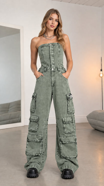 Front full-length view of model wearing sage green strapless cargo denim jumpsuit