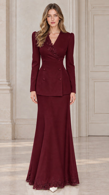 Front view of model wearing burgundy wine tailored blazer and mermaid skirt set