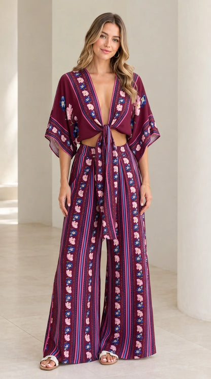Model wearing burgundy wine floral stripe tie-front top and matching wide-leg pants set
