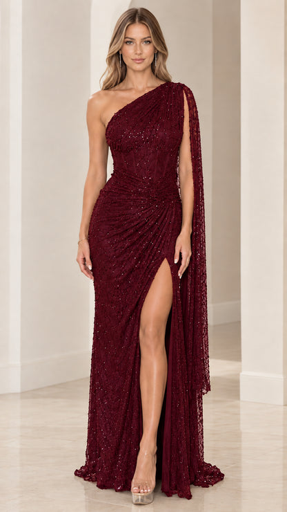 Full front view of burgundy one-shoulder cape sleeve embellished evening dress