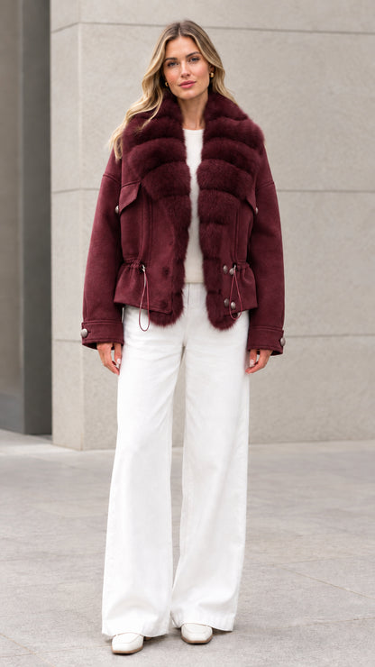 Woman wearing burgundy wine faux fur trim short outerwear coat