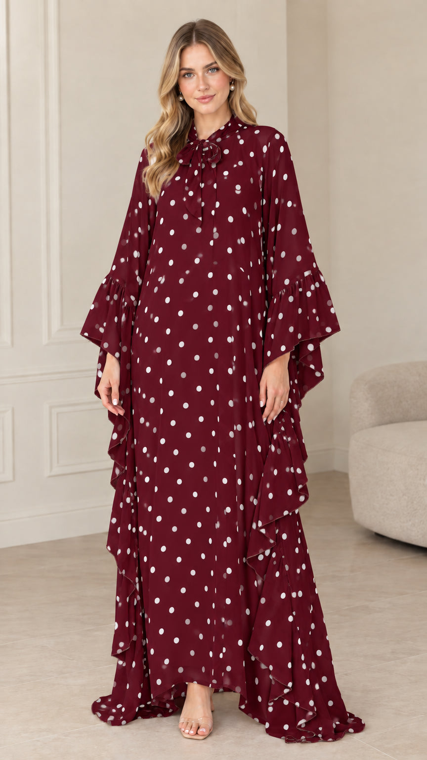 Full front view of burgundy polka dot ruffle long sleeve maxi dress