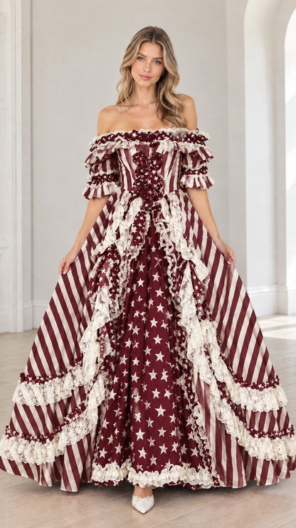 Full-length front view of burgundy red star and stripe tiered ball gown