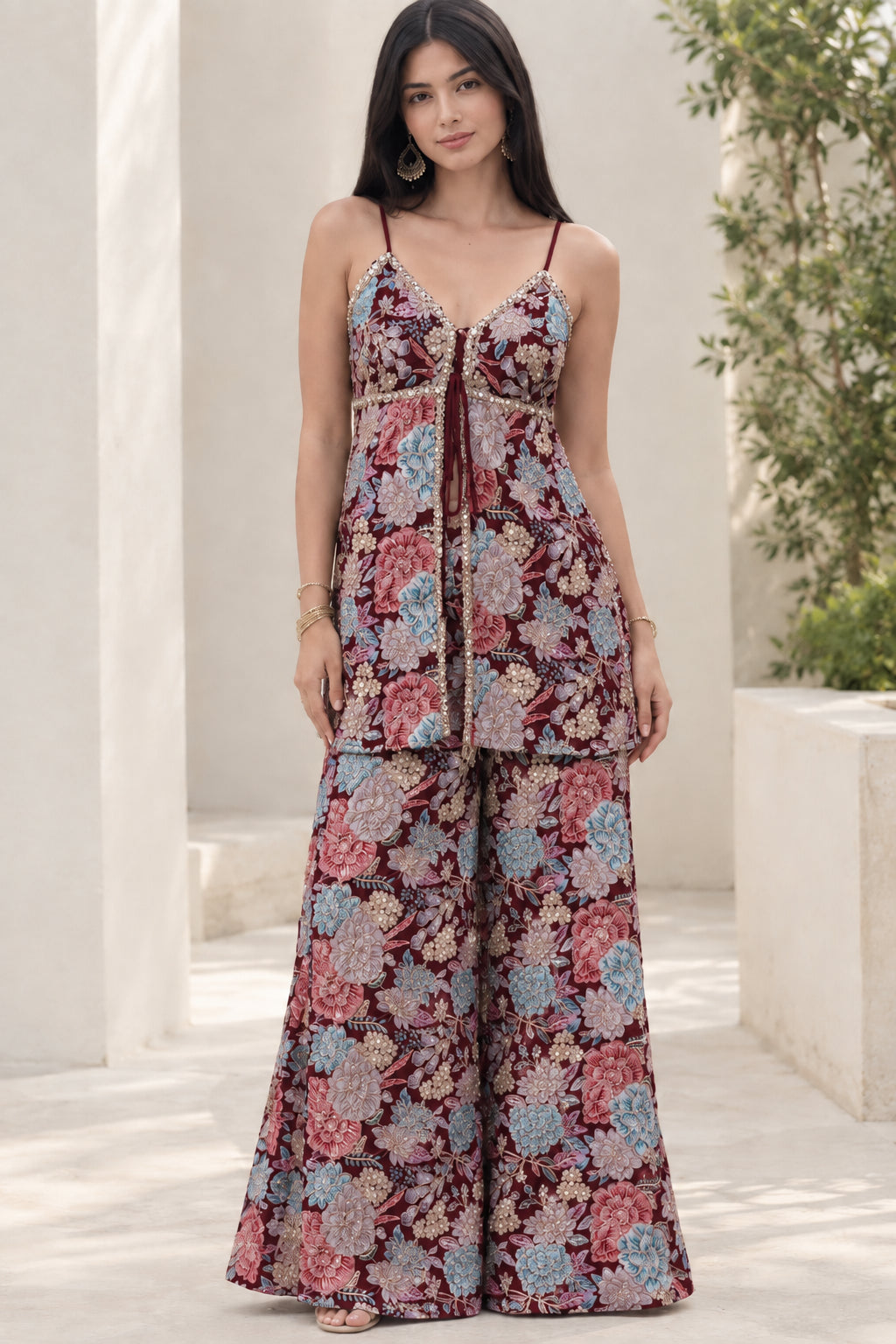 Model wearing Burgundy floral print empire tunic top and matching wide-leg pants set