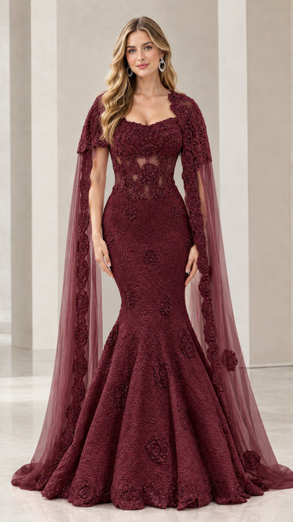 Burgundy red formal mermaid gown with illusion corset bodice and sheer cape
