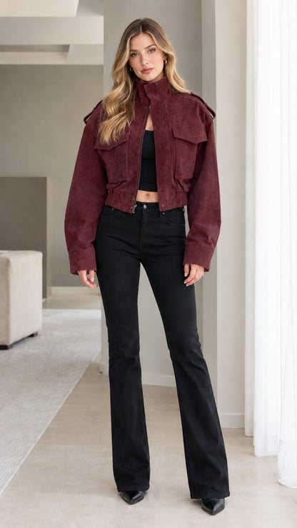 Model wearing Burgundy cropped utility jacket with front cargo flap pockets