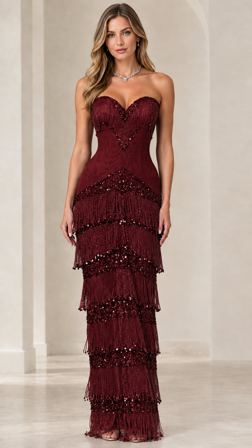 Front view of burgundy red strapless beaded fringe maxi dress