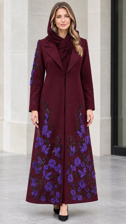 Burgundy full-length coat styled with purple floral embellishments