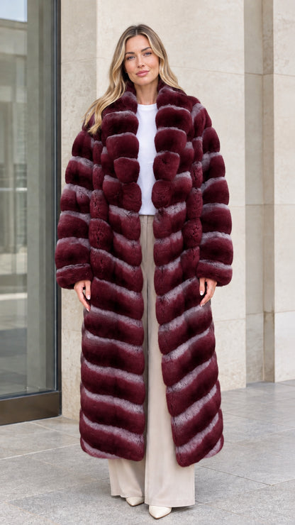 Model wearing Burgundy wine-red full-length plush faux fur coat