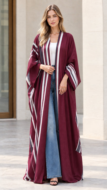 Full-length front view of woman wearing burgundy wine red striped maxi kimono duster