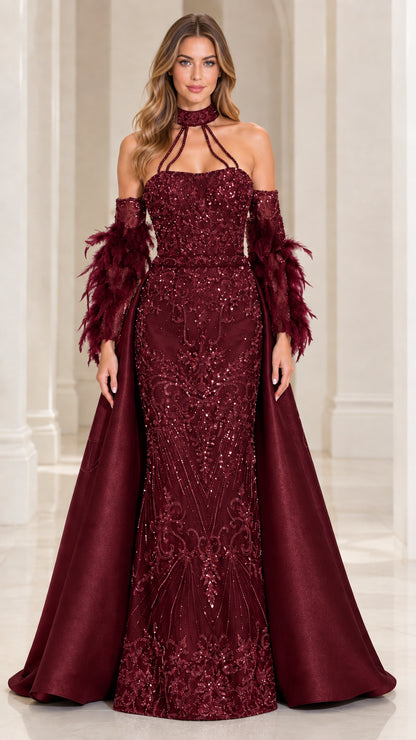Front view of model wearing Burgundy sequin mermaid evening gown with satin overskirt and feather cuffs