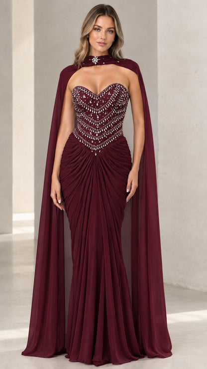 Burgundy red beaded bodice evening gown with high-neck sheer cape