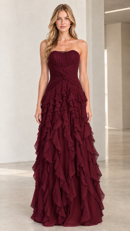Full-length front view of burgundy red strapless tiered ruffle evening gown