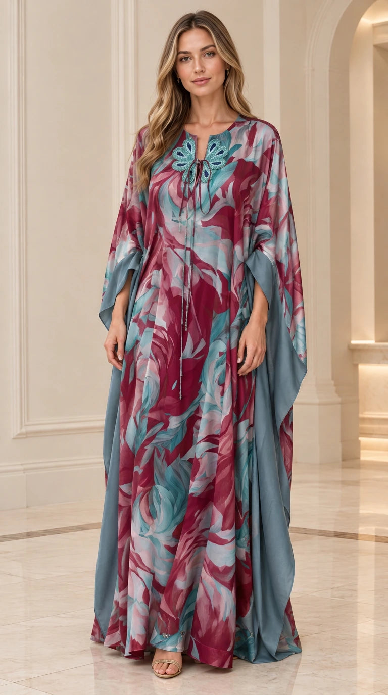 Full-length front view of burgundy and plum floral caftan maxi dress
