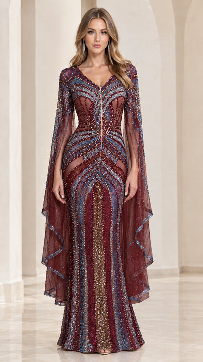Burgundy wine beaded mermaid gown with flowing cape sleeves on model