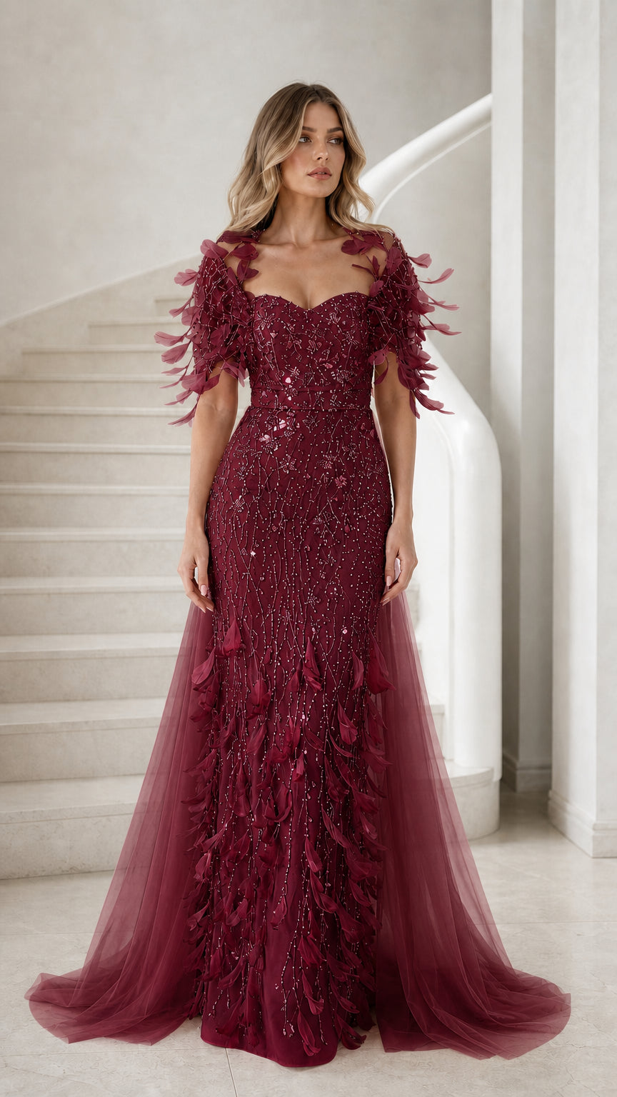 Burgundy wine red formal evening gown with sequin bodice and feather details
