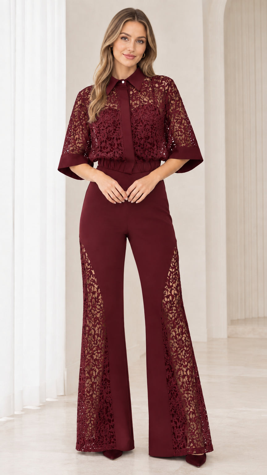 Front view of model wearing burgundy wine red floral lace flare jumpsuit