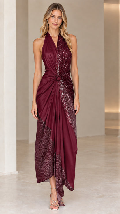 Front view of model wearing Burgundy tone-on-tone halter backless draped maxi dress
