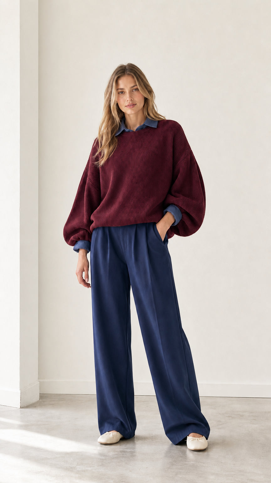 Model wearing burgundy wine red layered collared ribbed sweater