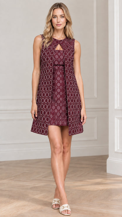 Model wearing Plum purple sleeveless geometric jacquard layered shift mini dress