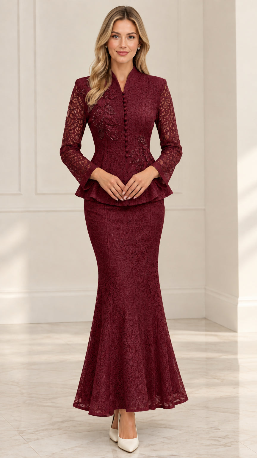 Front view of model wearing Burgundy red lace formal skirt suit with beaded details